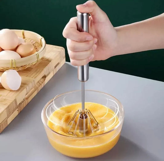 Hand-powered egg beater for effortless mixing and whipping